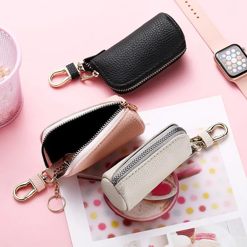 Black PU leather zipper key case showing expansion storage capacity