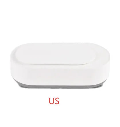 White portable ultrasonic cleaner machine with stainless steel tank for cleaning jewellery and glasses.