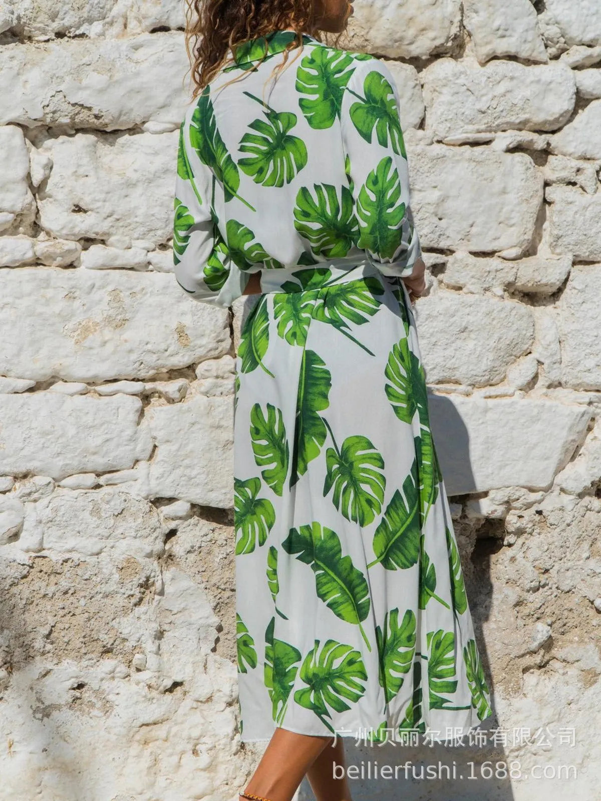 Women's vintage-inspired chiffon A-line dress with V-neck, high waist, and printed pattern.