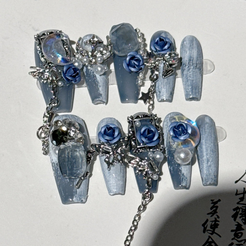 Heavy industry blue night nail stencils with ornate rose, tulip and flower patterns in plastic armour suit