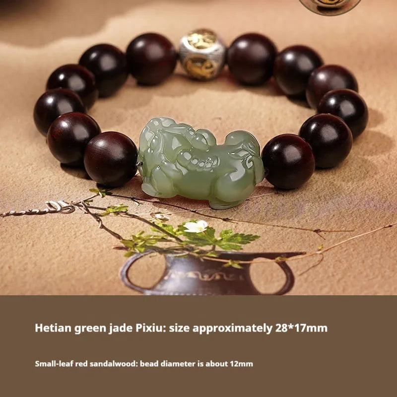 A Hetian jade bracelet with braided black and red rope in a Chinese style design.
