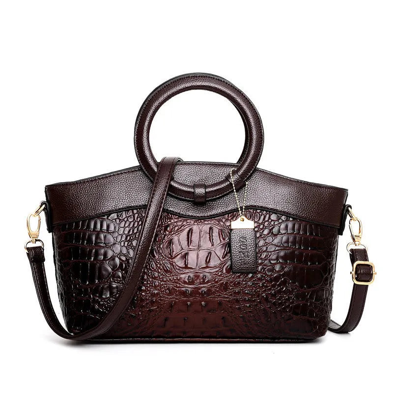 Ladies fabric handbag with multiple zipper compartments in six colour options showing organisational pockets