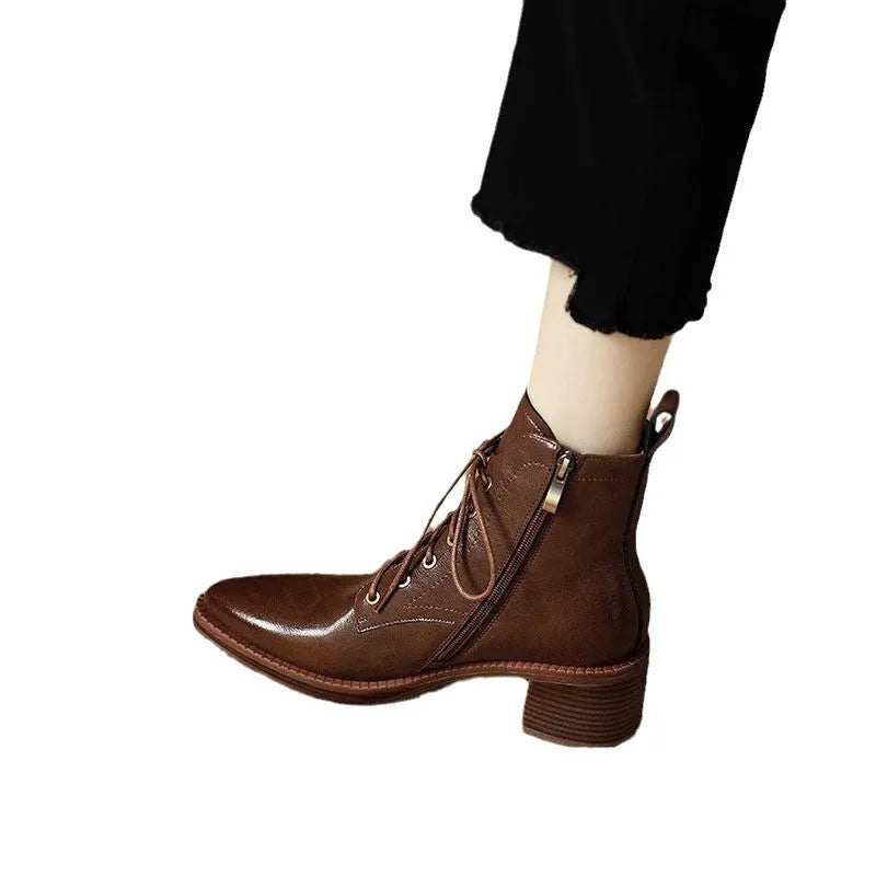 Women's black pointed toe short tube boots with 5.5cm block heel and ankle shaft height