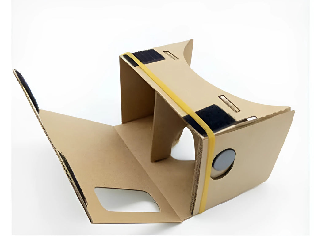 Pink and white cardboard VR glasses for smartphones with head strap and 3D lenses.