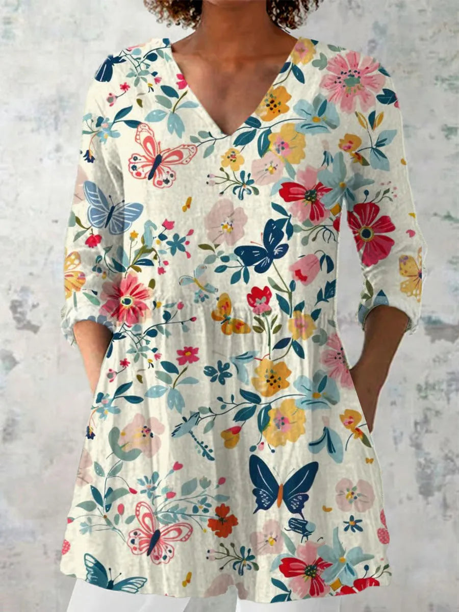 Women's slim-fit long-sleeved retro top with a digital print design on polyester fabric.