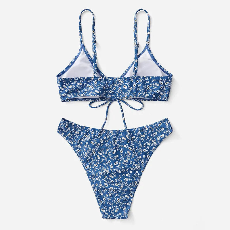 Blue polyester swimsuit three-piece set without underwire showing top and shorts separated