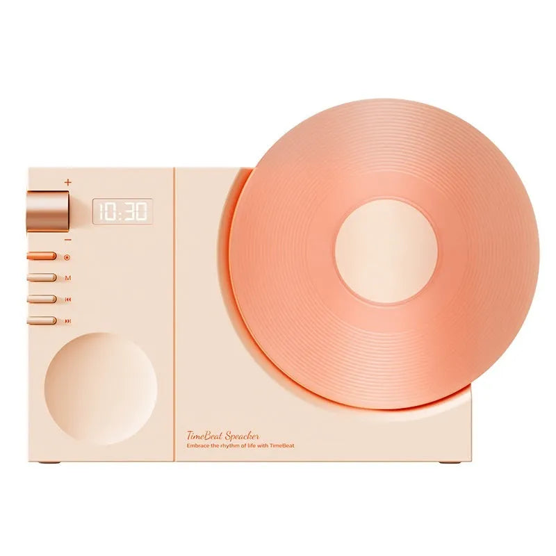 Mini Bluetooth portable speaker in coral pink with USB cable and gift bag