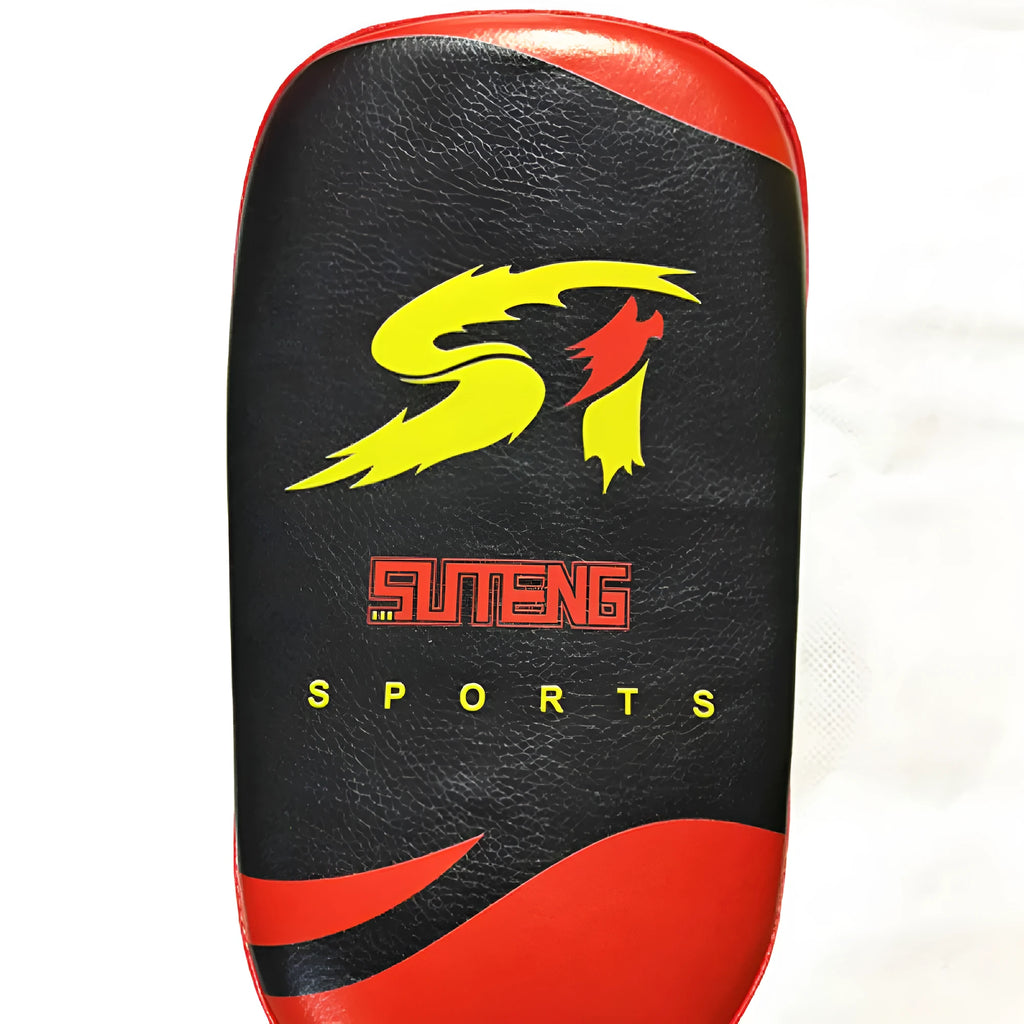 Black square boxing target pad with red trim and a double buckle strap on the back