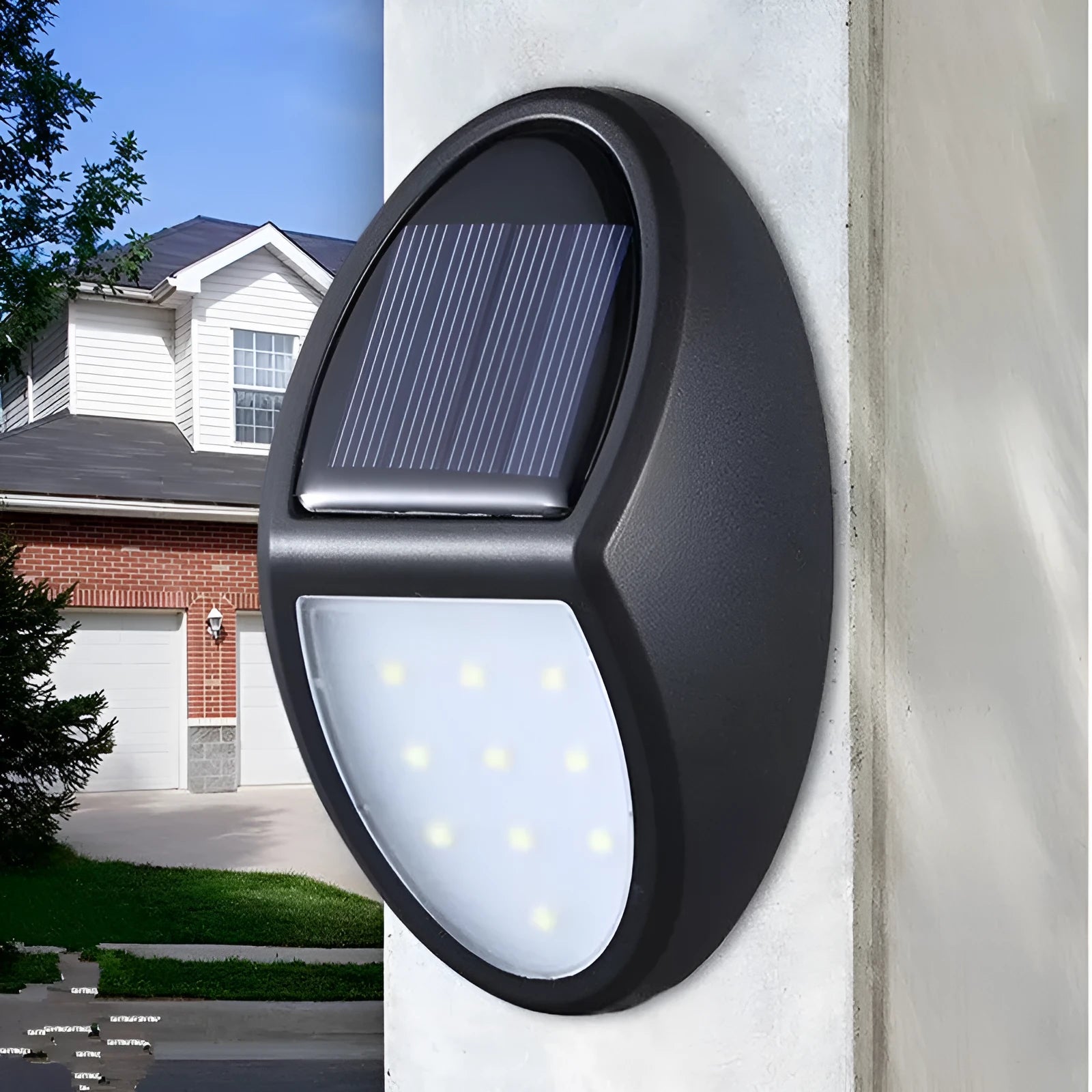 Black solar-powered LED wall light with solar panel and automatic activation