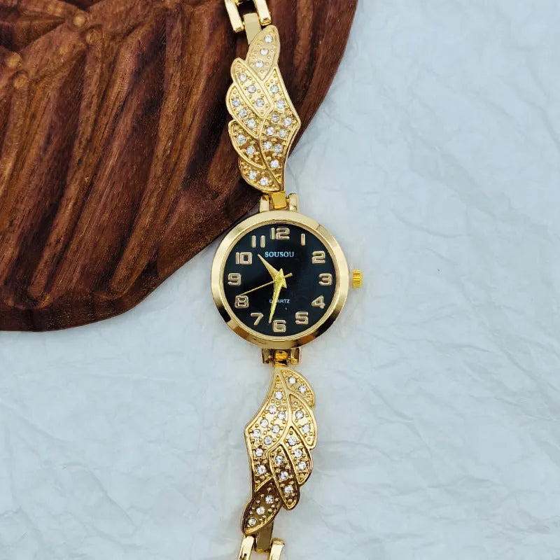 Women's stainless steel watch with round dial on a metal strap with Vachette clasp.