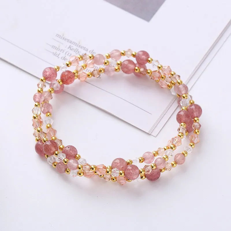 Women's adjustable three-ring crystal bracelet with colourful gemstones on wrist