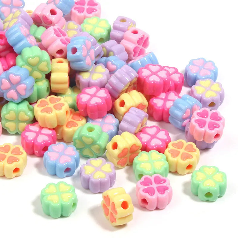 15mm acrylic craft beads with four-leaf clover shape and frosted finish in multiple colours