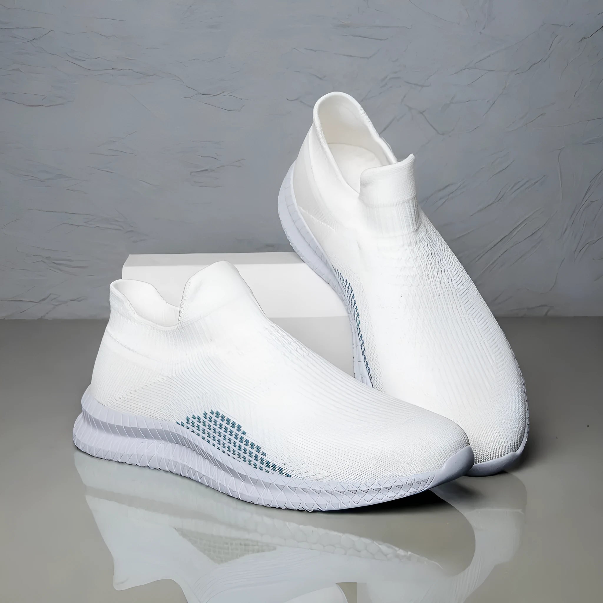 Popcorn Flyknit low top casual sneakers in white, black, and blue colours on a plain background.
