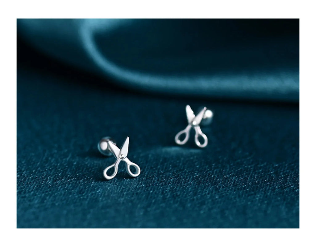 Silver screw-back ear nails with small scissors design for women's ear piercings