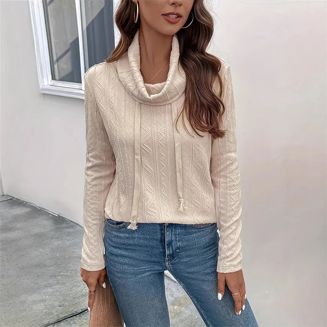 Apricot coloured long sleeve hooded pullover sweater with drawstring closure