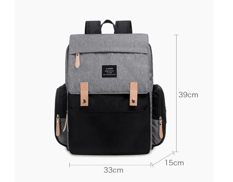 Large Oxford cloth diaper backpack with changing mat in beige colour, dimensions 33x39x15cm