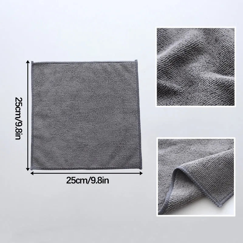 Grey square microfiber kitchen cleaning cloth for oilproof decontamination of pots and bowls.