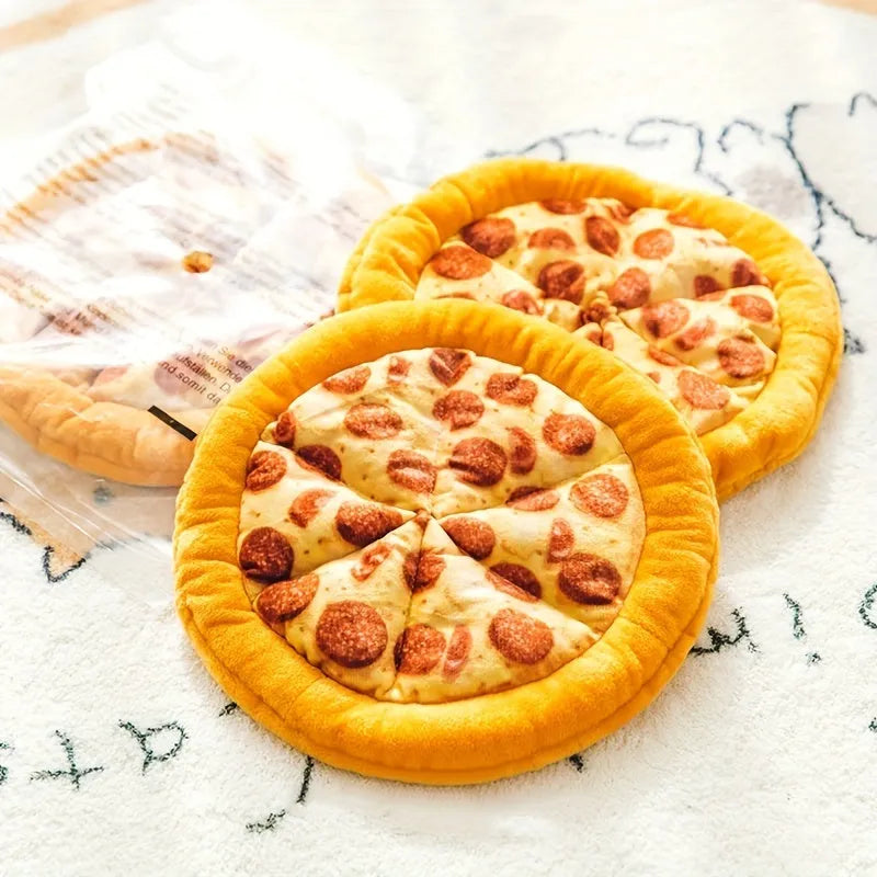 Yellow pizza-shaped squeaky dog toy for teeth grinding and chewing