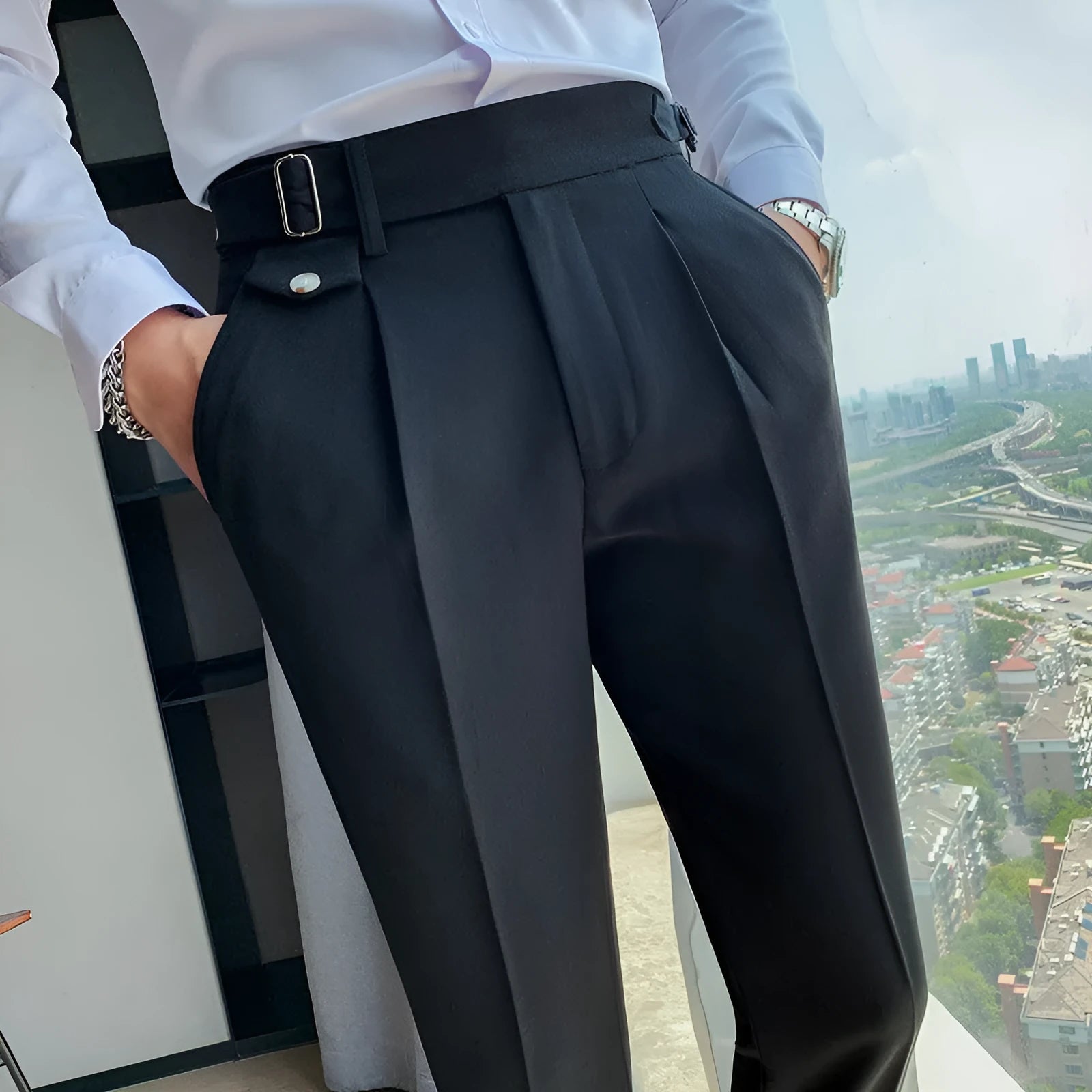 Straight-leg casual trousers in solid colour on hanger showing waistband and leg detail