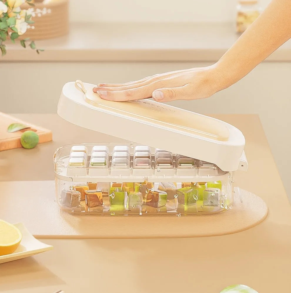 High-capacity plastic ice cube tray with ice shovel in blue, green, purple, or yellow colour options.