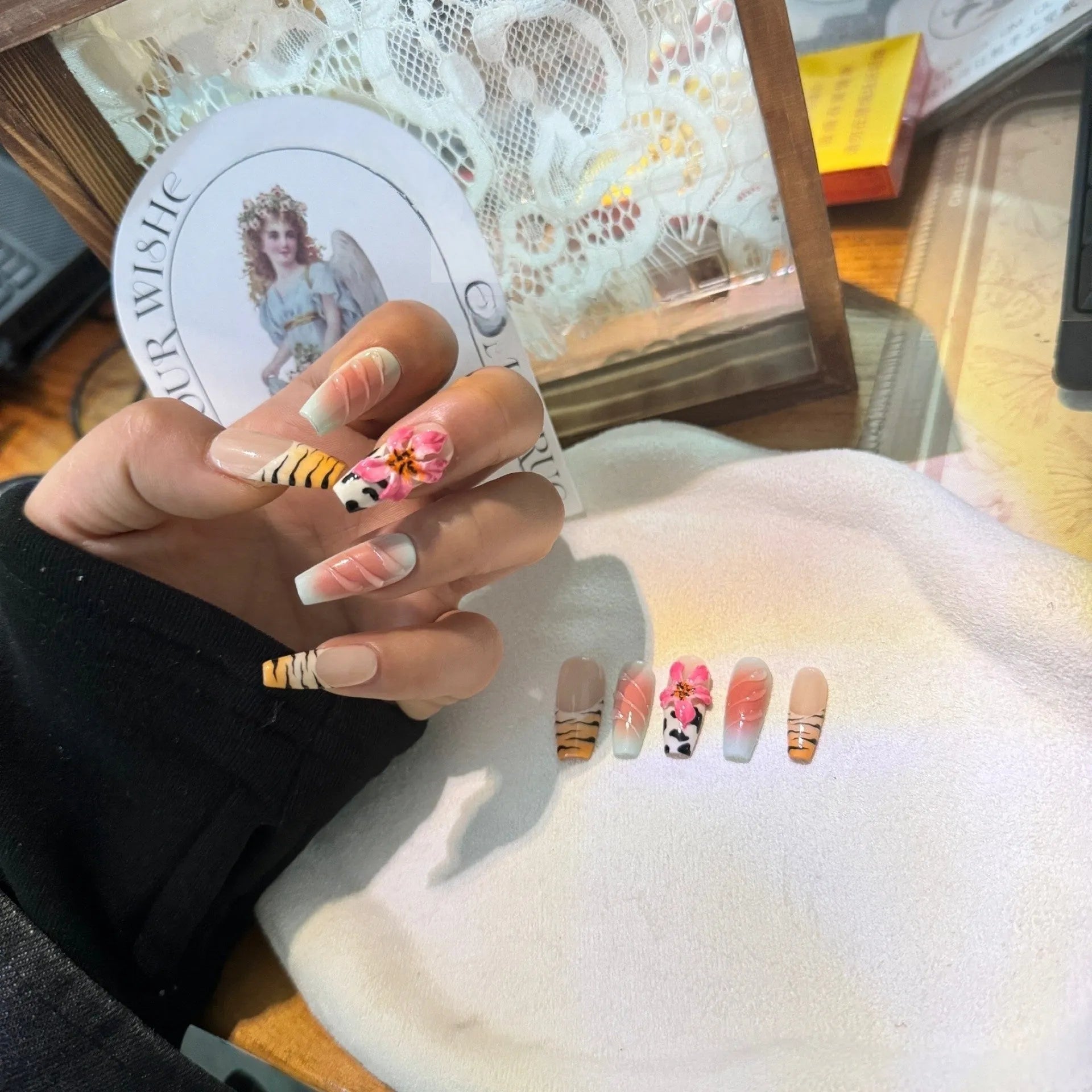 Lily hand carving nail art set with zebra patterns and embossed flowers in sizes XS S M L