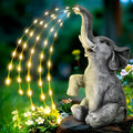 Resin elephant outdoor garden sculpture with LED light strip on grass