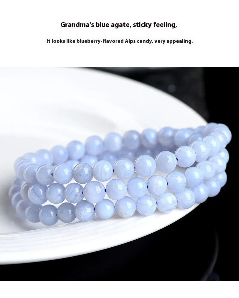 Blue agate bracelet with natural striped patterns on 6-6.8 mm beads in unisex design