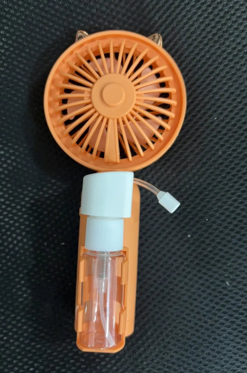 Personalised plastic USB desktop fan in choice of colours on a desk