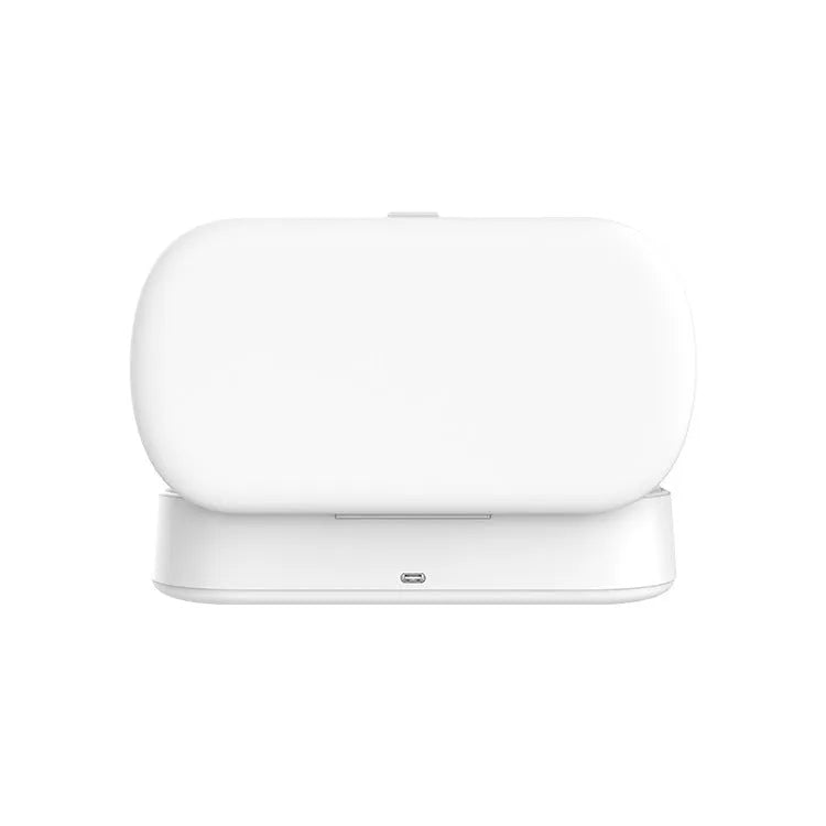 White ABS plastic wireless UV sterilizer box with disinfection chamber and wireless charging pad.