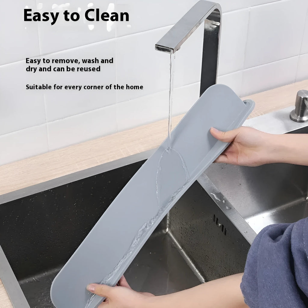 Grey silicone kitchen sink water blocking plate showing dimensions 52x5x85mm