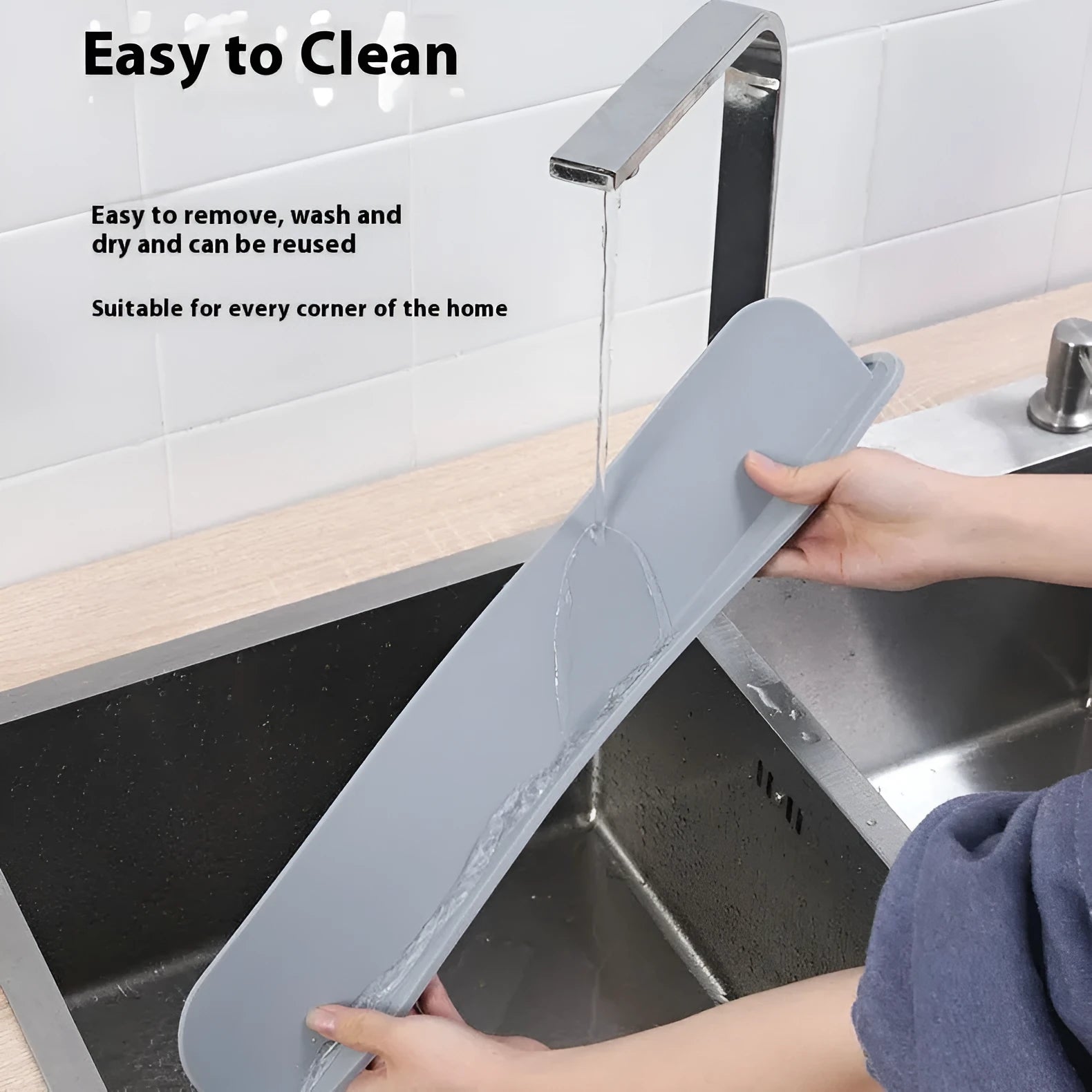 Grey silicone kitchen sink water blocking plate showing dimensions 52x5x85mm