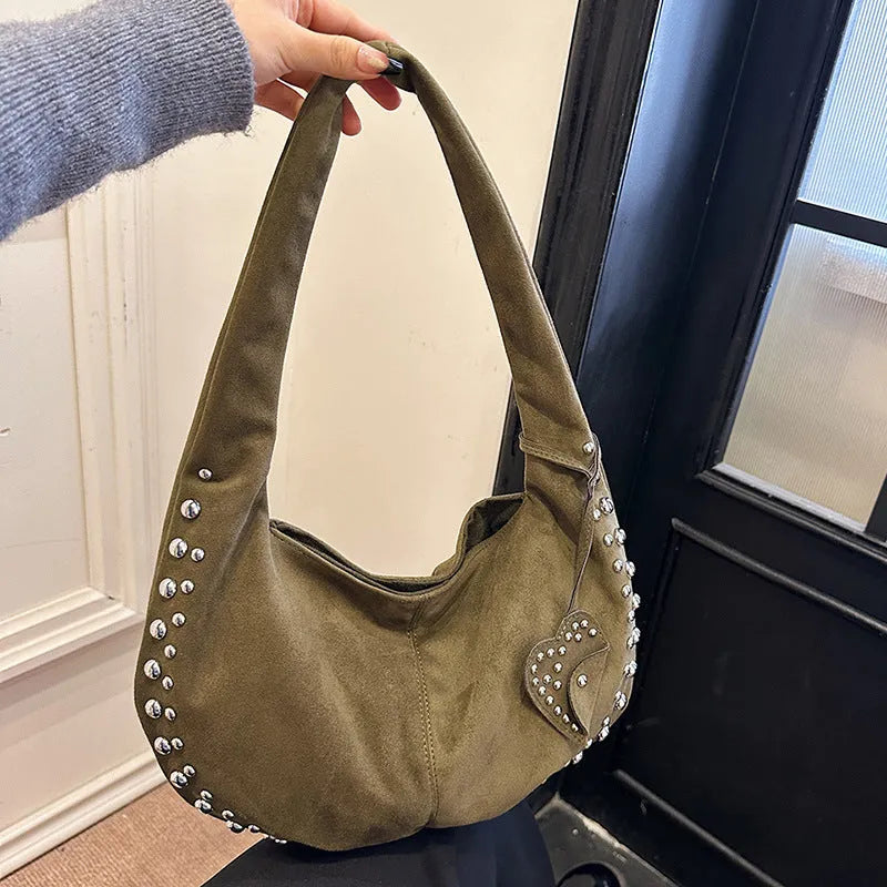 Women's soft plush tote handbag in retro styling with strapless underarm design