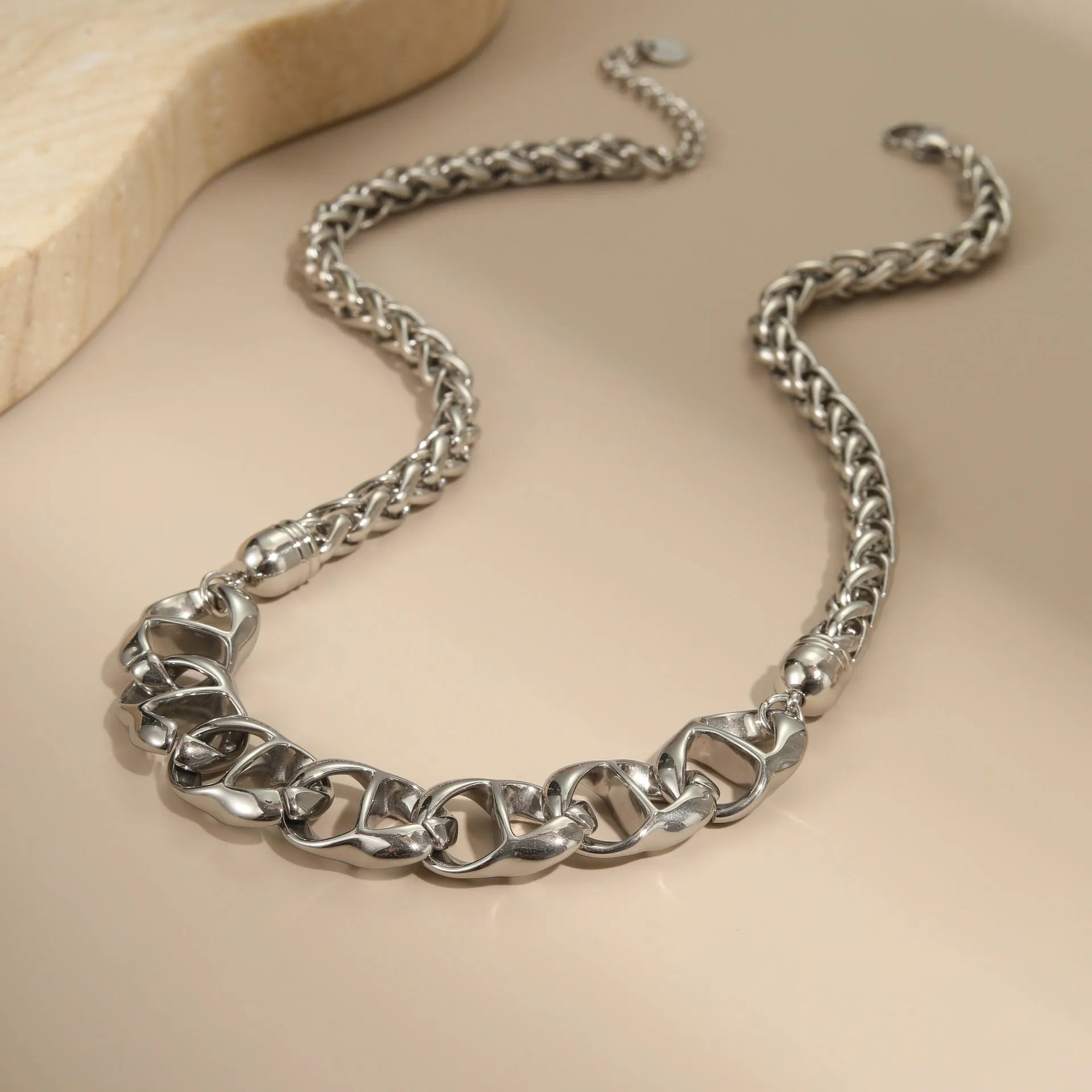 Stainless steel necklace with geometric pendant and electroplated 18K gold finish