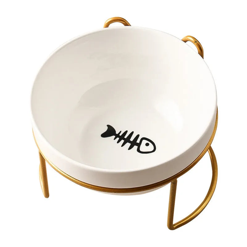 White ceramic cat bowl with cat paw print pattern in a black iron cat-ear frame