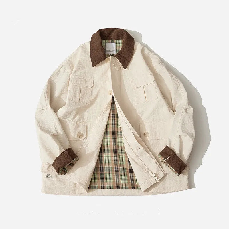 Green and apricot casual jacket with side seam pockets, long sleeves, and solid pattern