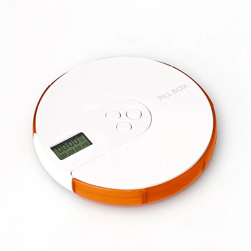 Seven-compartment alarm clock pill dispenser showing medication storage and electronic display