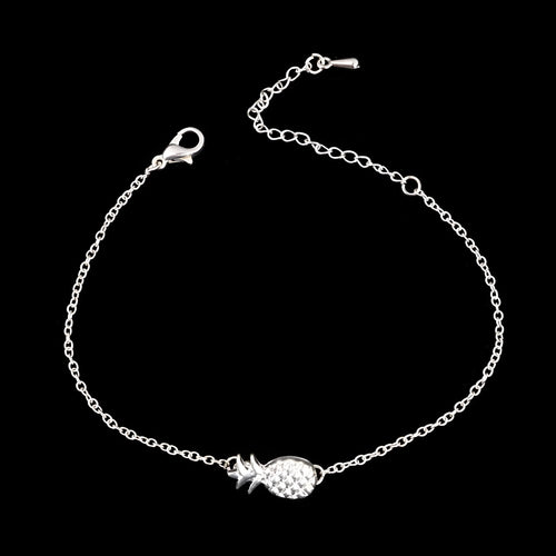 Women's alloy bracelet with pineapple charm in gold or silver tone