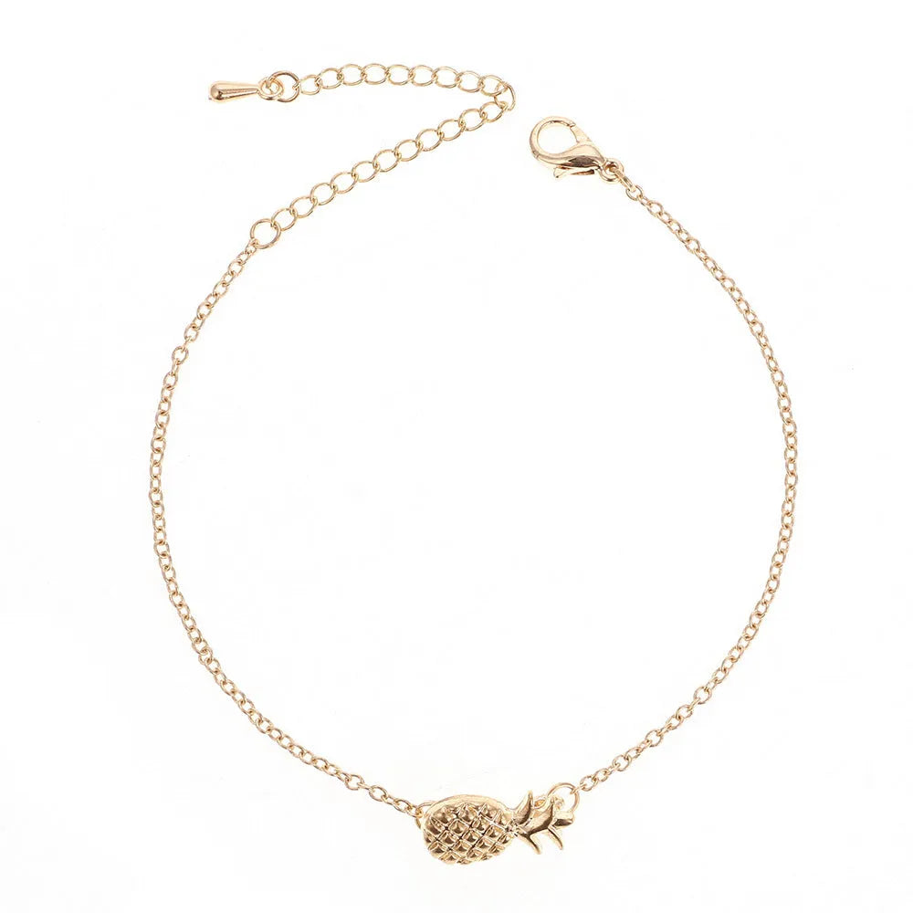 Women's alloy bracelet with pineapple charm in gold or silver tone