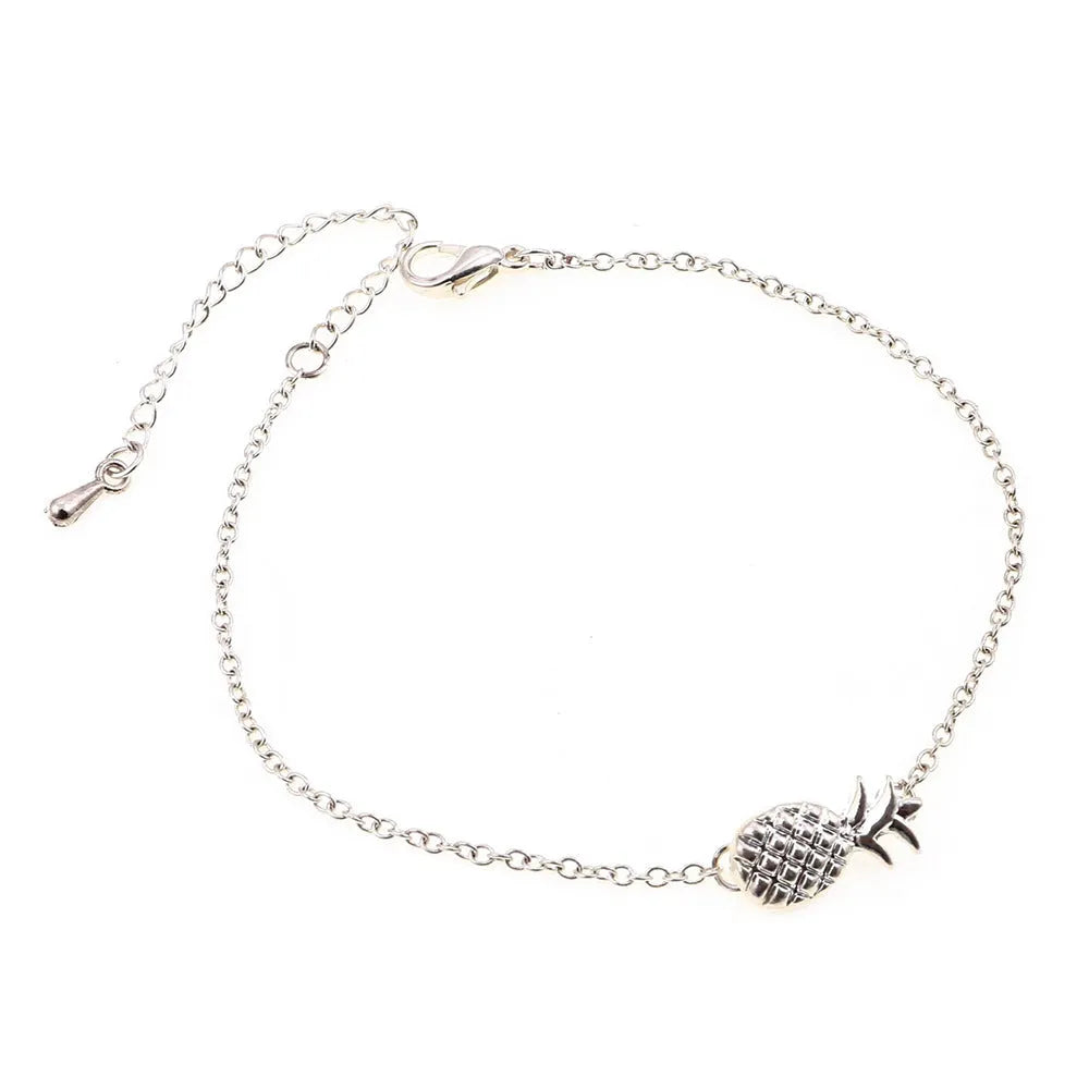 Women's alloy bracelet with pineapple charm in gold or silver tone
