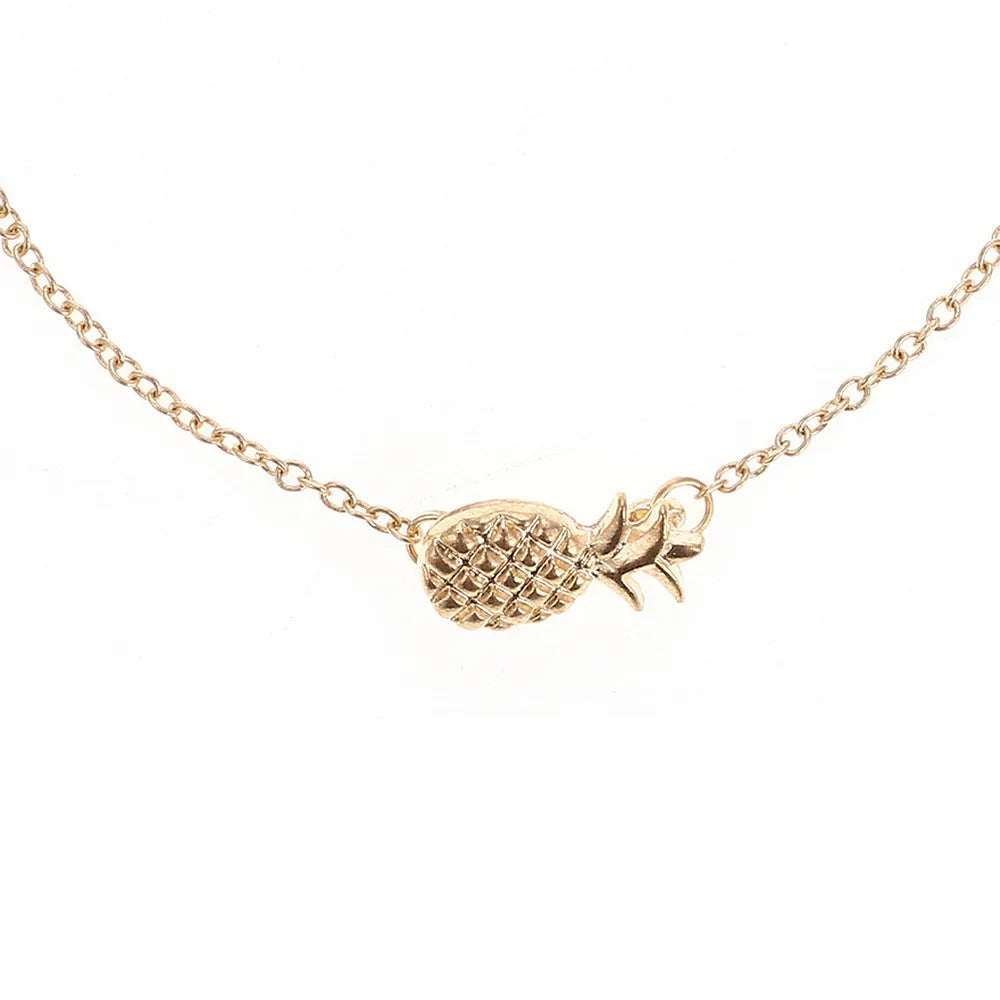 Women's alloy bracelet with pineapple charm in gold or silver tone