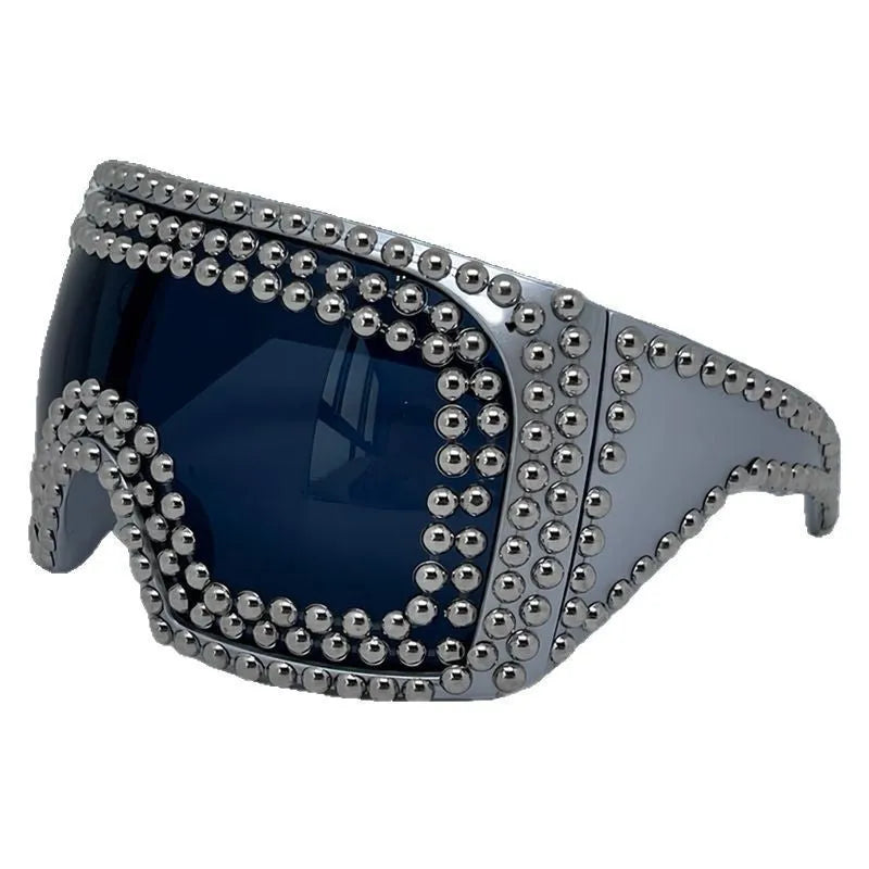 Men's punk-inspired large rim square sunglasses with visible rivet detailing in silver colour