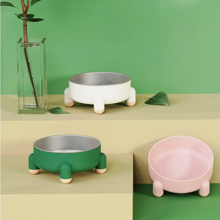 Stainless steel pet bowl with high foot and non-slip base in green, pink, or white colour