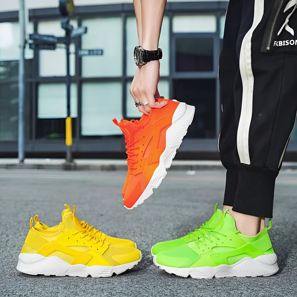 Men's low top casual shoes with mesh upper and cross shoulder straps in fluorescent colours