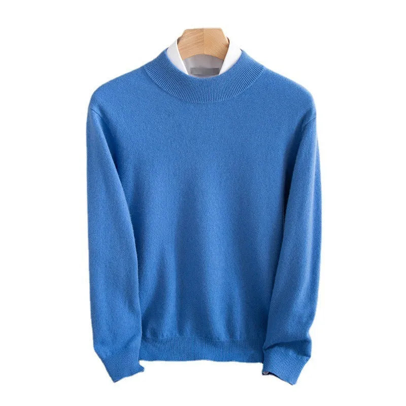 Man wearing a loose-fit half-collar wool sweater in a dark colour, showcasing the knitted texture and neckline design.