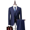 Men's navy blue slim fit three-piece plaid suit with jacket, vest, and trousers on a hanger.