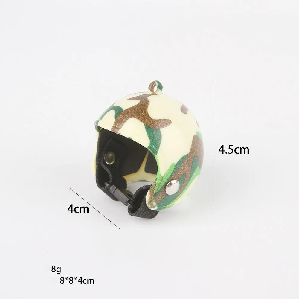 Small hard plastic pet helmet with elastic adjustment straps and sponge lining for chickens and birds