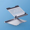 Aluminium laptop stand with 8-in-1 docking station in deep space grey on a desk