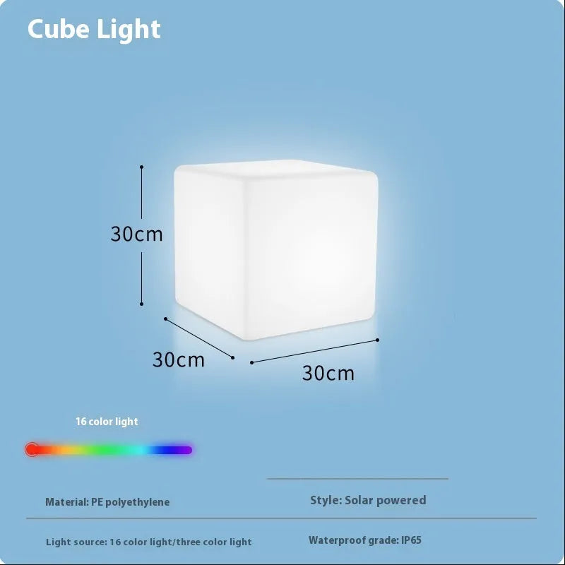 Square LED cube light stool in modern design showing waterproof PE construction with solar panel or charging port visible