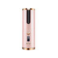 Portable mini curling iron with USB charging port and ceramic barrel on white background