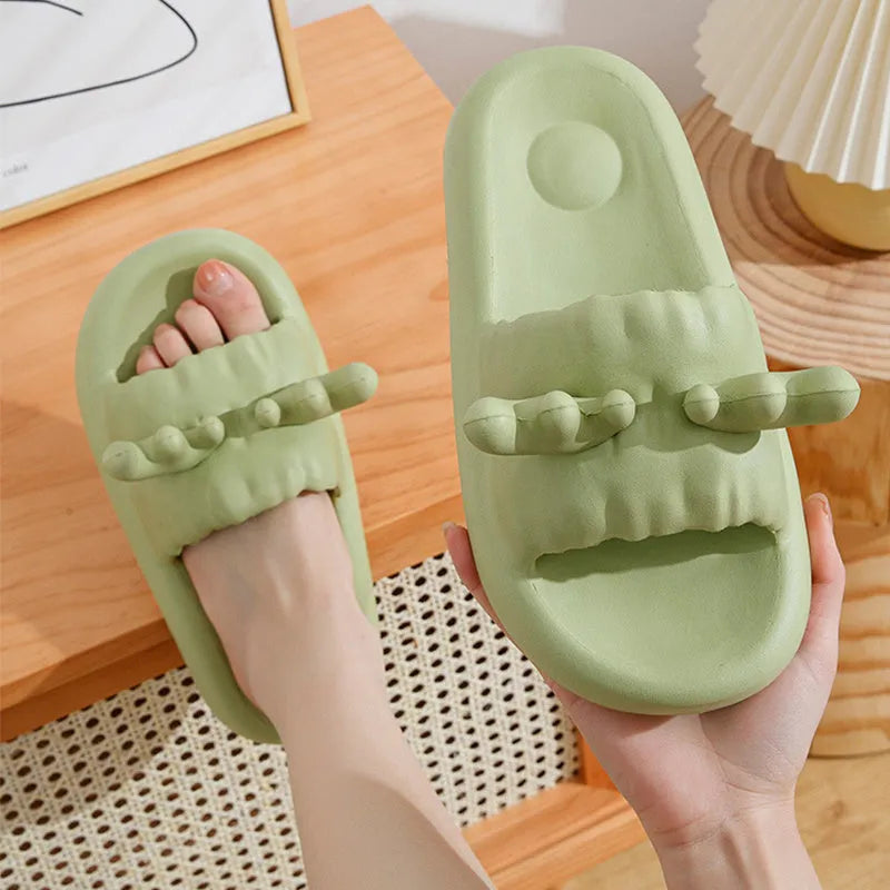 White women's flip flop slippers with deer horn design and hollow-out EVA upper on a light background.